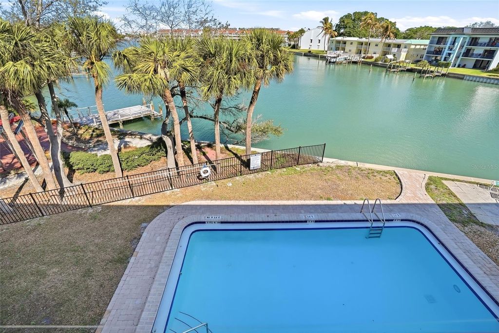 Photo of 11901 Lagoon Lane #303, Treasure Island, FL 33706 (MLS # TB8482182)