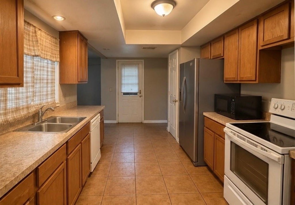 Photo of 2711 Pioneer Road, Orlando, FL 32808 (MLS # O6452313)