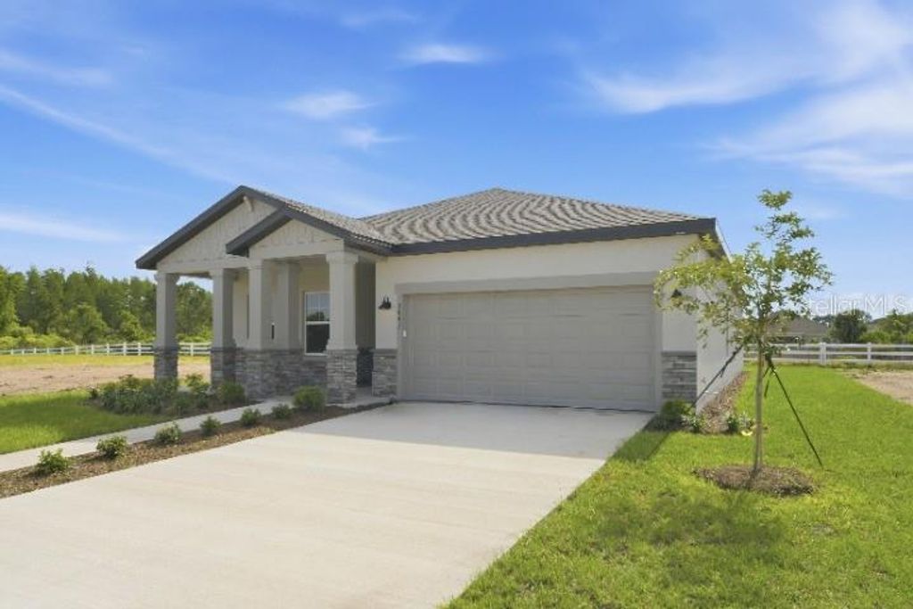 Photo of 1643 Dragon Head Way, Saint Cloud, FL 34771 (MLS # TB8504215)