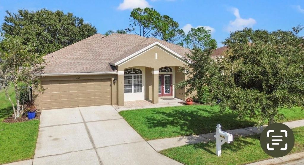 Photo of 5602 Riva Ridge Drive, Wesley Chapel, FL 33544 (MLS # TB8437655)