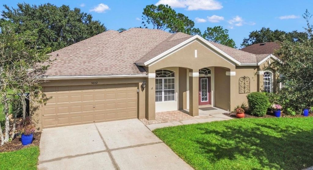 Photo of 5602 Riva Ridge Drive, Wesley Chapel, FL 33544 (MLS # TB8437655)