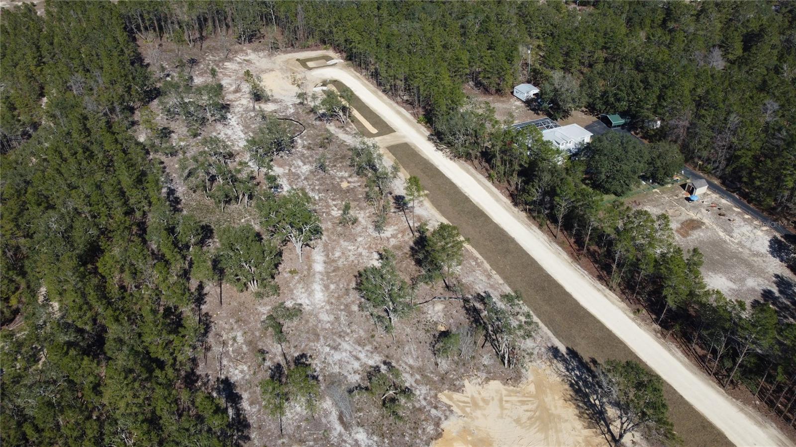 MOTIVATED SELLER!
Build Your Forever Home at Centralia Trails.
Whether you dream of a charming mini-ranch, a farmhouse with stables, a homestead with some room between neighbors, or a family compound spanning nearly 10 acres, Centralia Trails in northwest Hernando County offers the perfect backdrop.
This exclusive, Ag Residential community consists of just four parcels, each approximately 2.37 acres, zoned Agricultural Residential and located in Flood Zone X—so no flood insurance is required. Centralia Trails is located on Haven Trail, a private road shared by all four parcels, providing direct access to Centralia Road without easement concerns.
Agricultural Residential zoning allows for a rural lifestyle with light agricultural opportunities not available in most residential areas. Each parcel permits up to two mature hooved animals and two offspring under one year old—ideal for equestrian enthusiasts or families looking to raise livestock.
Barns and stables are allowed, offering shelter for animals, storage for equipment, or space for additional vehicles. Deed restrictions help preserve the community's aesthetics and protect your investment value.
Don’t wait to secure your piece of rural paradise in Hernando County—opportunities like this are rare! Bulk pricing is available with purchase of multiple parcels. Call today to schedule a tour of the property!
All information provided is intended to be accurate. Buyer / Buyer's Agent to verify all information.
Lots 2, 3, and 4 available as well. See MLS listings W7871191, W7871194, and W7871196.