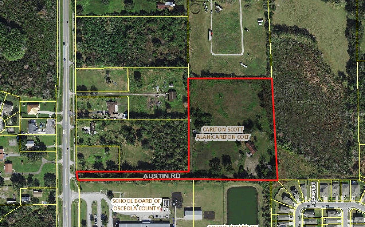 This exceptional 8+ acre property presents a rare opportunity for investors, builders, or those seeking a private sanctuary. Whether you envision developing a boutique subdivision—ideal for single-family homes, townhomes, or duplexes—or creating your own secluded paradise, this property offers unmatched versatility. Nestled away from traffic yet conveniently surrounded by established and emerging communities, the land currently holds a private residence, horse paddock, fenced pasture, and barn/workshop. This property would need to be rezoned for the highest and best use. With national builders already shaping the area, now is the time to seize this incredible investment opportunity. Builders and developers, don’t miss out!