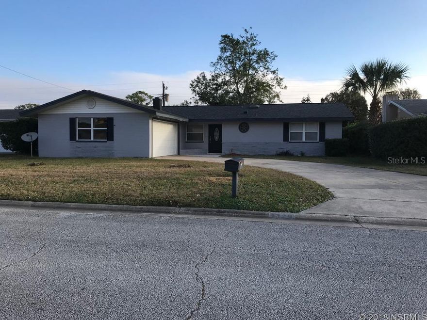Immaculate Turn-key home located in Fairway Estates Communitynear Daytona Beach Golf club and not far from the Halifax river yet in the heart of Daytona -  4 bedroom 2 bath, large 2 car garage, Florida room. Cozy living room with fireplace off the living room you will enter the Florida room through the newly installed sliding glass door - Upgrades include  -New roof in 2015, new garage door, new HVAC and water heater in 2014, new flooring - engineered hardwood living room and hallway, tile in kitchen, new carpet in bedrooms, both bathrooms remodeled, updated kitchen with stainless steel appliances , Entire interior freshly painted cheerful and bright and very clean in addition there are new light fixtures.Measurements are approximate and should be verified ;Water: City