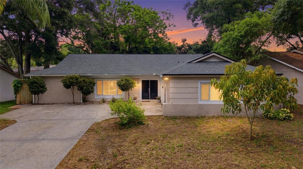 Photo of 2447 Grove Ridge Drive, Palm Harbor, FL 34683 (MLS # TB8512191)