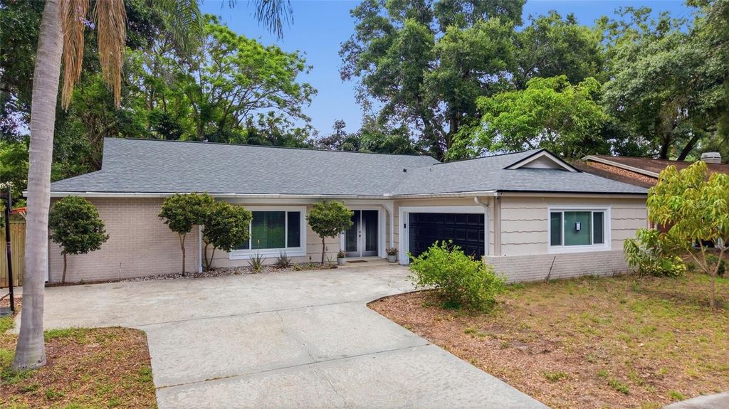 Photo of 2447 Grove Ridge Drive, Palm Harbor, FL 34683 (MLS # TB8512191)