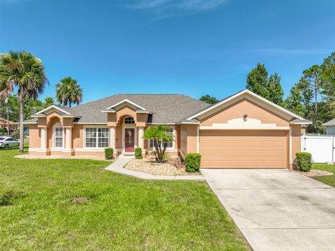 Photo of 1 Pine Bluff Lane, Palm Coast, FL 32164 (MLS # FC311774)