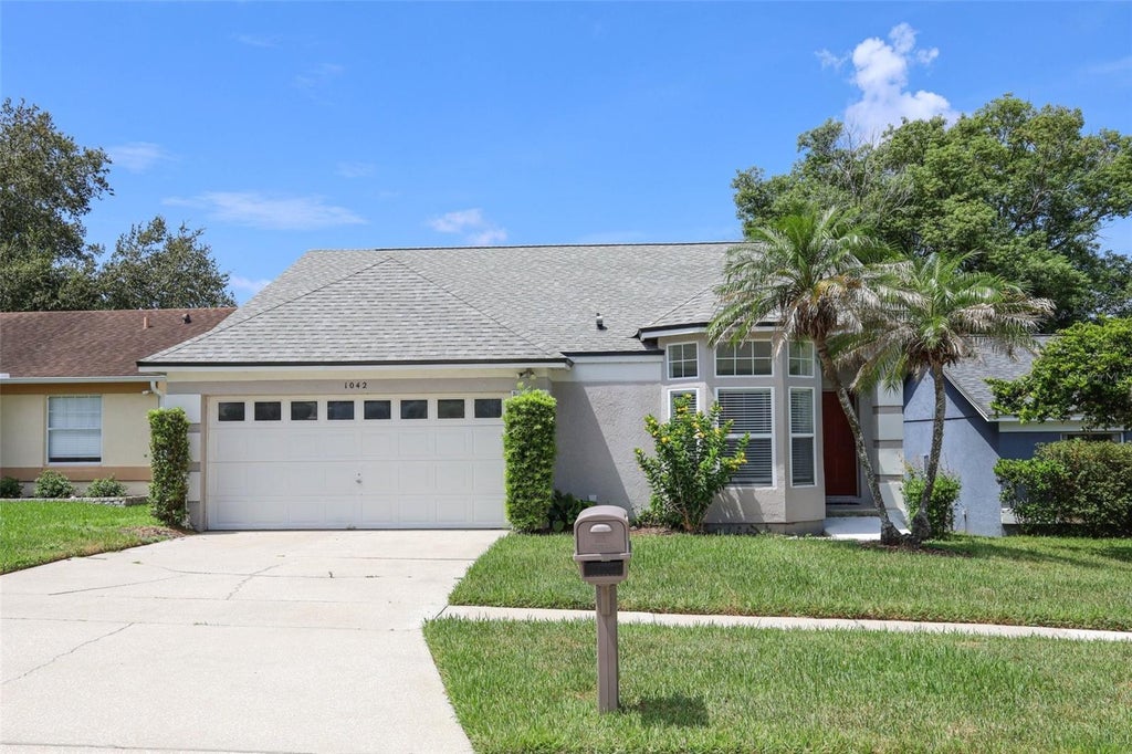 Photo of 1042 Piedmont Lakes Boulevard, Apopka, FL 32703 (MLS # O6438199)