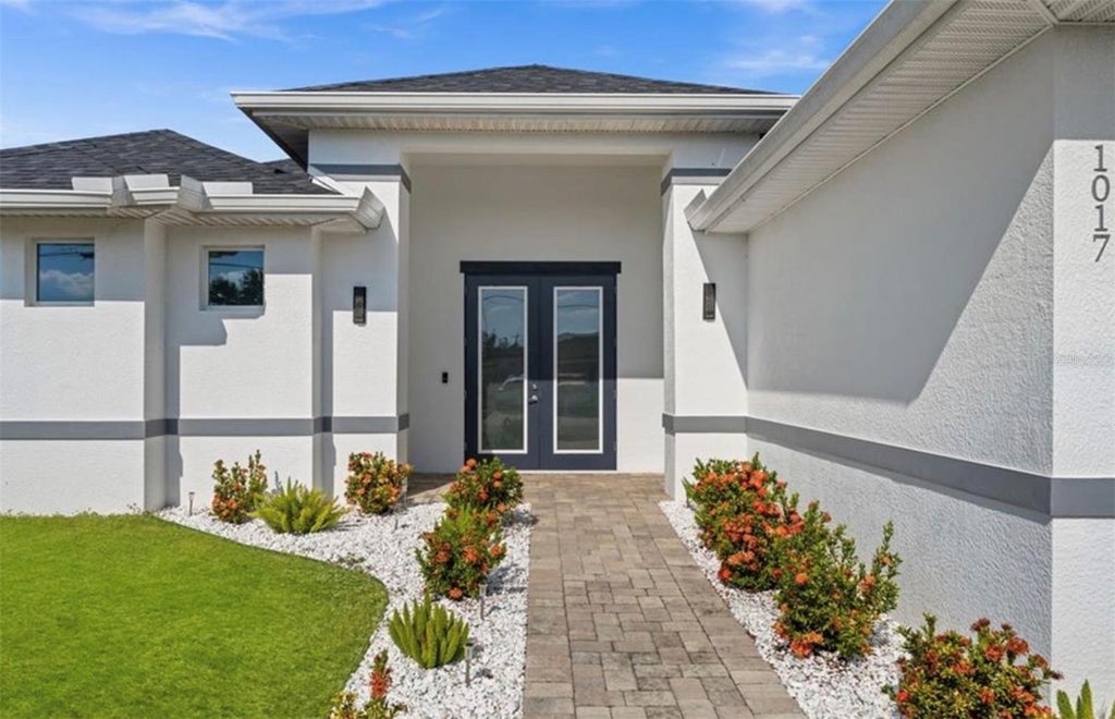 Photo of 1017 NW 15th Terrace, Cape Coral, FL 33993 (MLS # TB8528506)