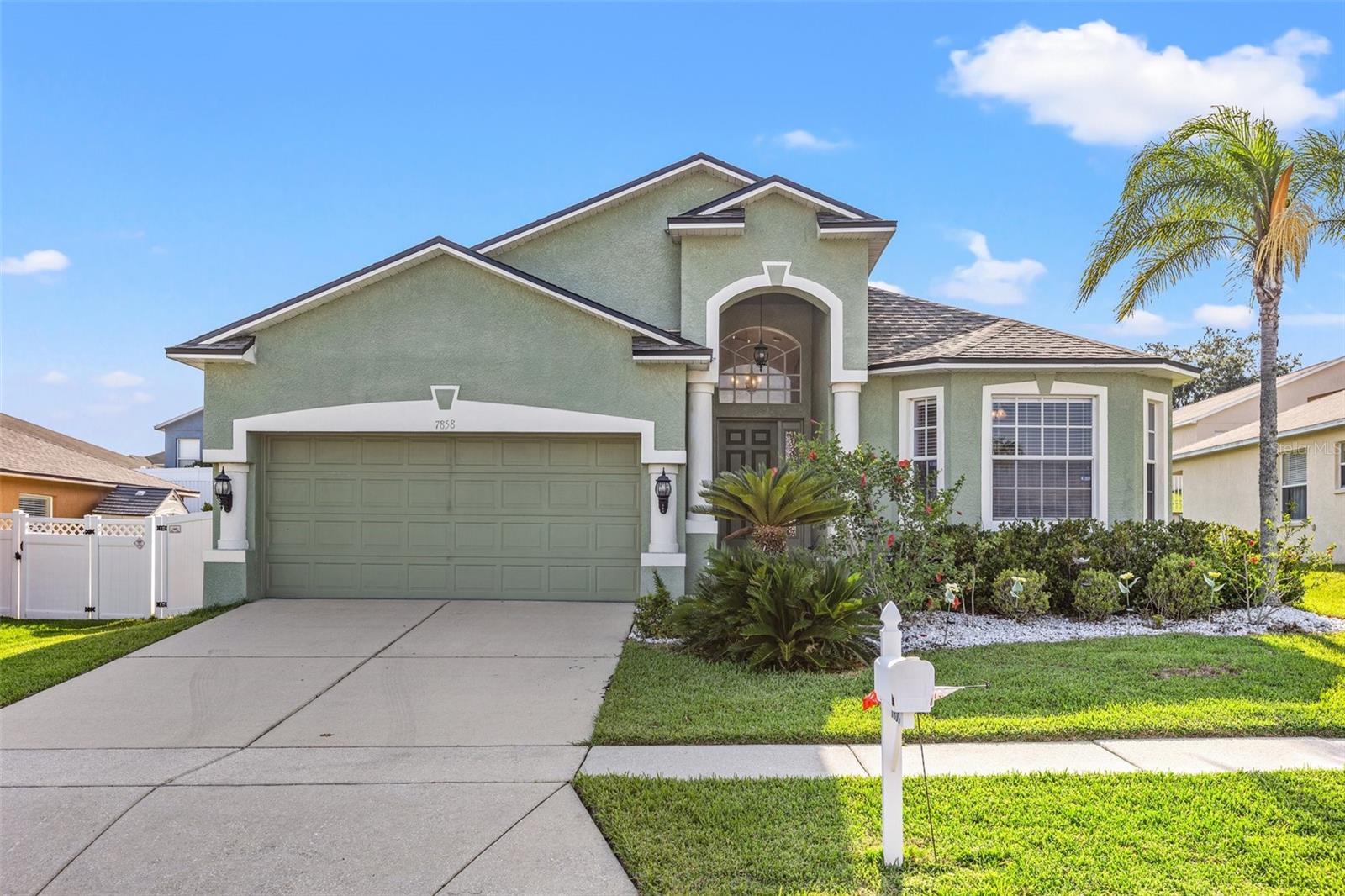CRESTVIEW HILLS with 2022 ROOF and 2020 AC! This 4 bedroom 3 bath home is spacious, has a wonderful floor plan and ALL the big ticket items have been done for you. The foyer greets you as your enter and you see the 12.5 foot ceiling here as well as in the huge 25 x 14 living room. No laminate flooring or carpet in this home - wood floors abound in the living spaces and bedrooms and ceramic tile in the kitchen and baths. There's a sliding door in the living room that leads to the rear covered porch. The dining room is 13 x 9 and has plenty of space for a large table, chairs, hutch and even a nook for a desk or extra cabinet. The kitchen is nicely appointed with a 9 foot breakfast bar, pantry, reverse osmosis system installed under the kitchen sink and a laundry closet with a washer and dryer that convey with the home. The water softener also conveys and is located on the exterior of the home on the south side. The master suite offers a vaulted ceiling, a sliding door that leads to the porch and a walk-in closet that is 10 x 6.5. The en suite bath features dual sinks and garden tub with separate shower. The bedrooms are a split plan with the master on the left side of the home, bedroom 2 at the front of the home and bedrooms 3 & 4 toward the rear of the home. Bedroom 2 is nicely sized and there's a linen closet in the hall. The adjacent bath has a tub/shower combo and a medicine cabinet. Bedrooms 3 & 4 are a "jack and jill" floorplan! Bedroom 3 has a vaulted ceiling and the bathroom has a tub/shower combo. The HOA fees are LOW and the community is GATED! Located near shopping, restaurants and entertainment the location just off HWY 301 is close to EVERYTHING. Come see this stunning home TODAY! | Roof 2022 | AC 2020 | Water heater 2022 | Exterior paint 4-5 years ago, front door fresh paint June 2023 | Landscaping freshened up June 2023 | New garage door opener April 2023 | Power washed fence June 2023 |