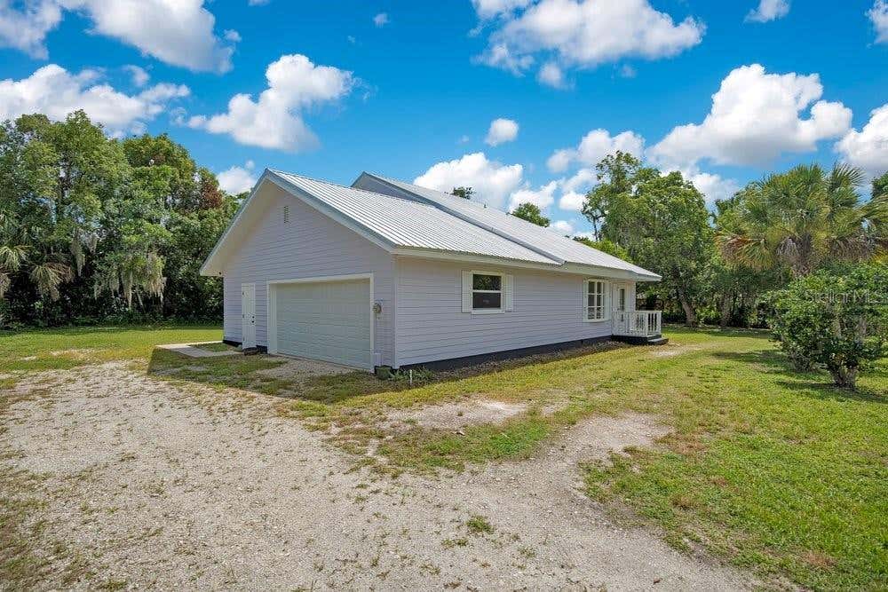 Photo of 110 W Washington Avenue, Deland, FL 32720 (MLS # V4949522)