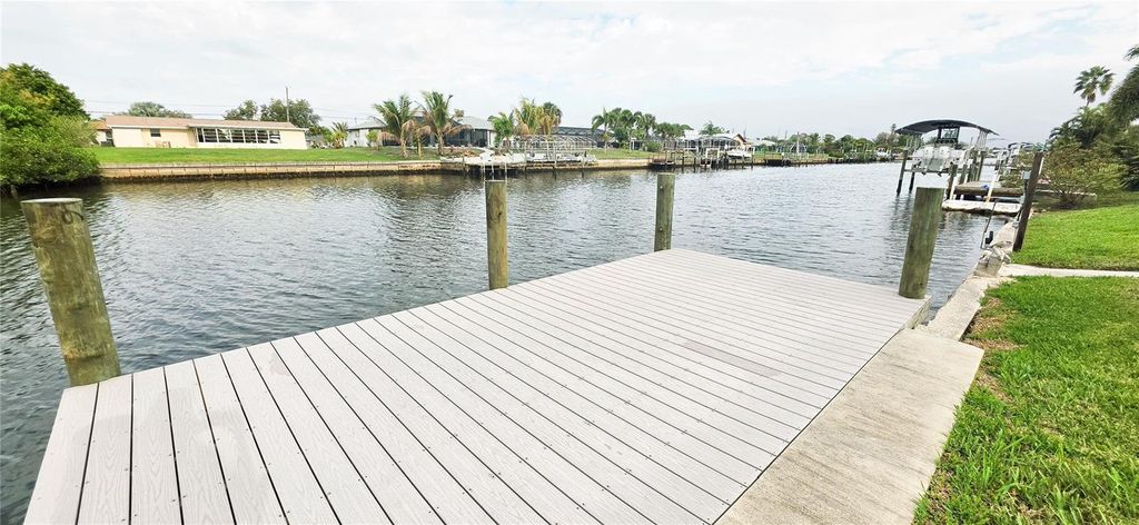 Photo of 392 E Tarpon Boulevard NW, Port Charlotte, FL 33952 (MLS # C7523359)