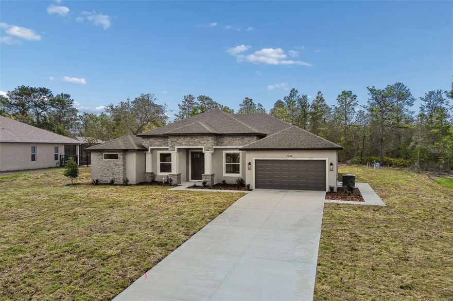 "North-Facing home with beautiful sunset views front the backyard" Experience elevated living in this stunning brand-new home in beautiful Weeki Wachee, FL. Offering 5 spacious bedrooms, 3 full bathrooms, and a 2-car garage, this modern residence features open and airy living spaces designed for comfort and style. This open concept floor plans offers spacious living areas filled with natural light.
Step into your extraordinary backyard with endless possibilities — build the pool of your dreams and unwind while enjoying breathtaking sunset views every evening. This property features a sprinkler system in both de front and the back yard. The garage showcases a sleek, durable epoxy-coated floor, adding both style and functionality. Located in an elegant and peaceful community close to restaurants, medical facilities, and excellent schools, with convenient access to the Suncoast Parkway for easy travel to Tampa.
This is more than a home — it’s the lifestyle you’ve been waiting for.