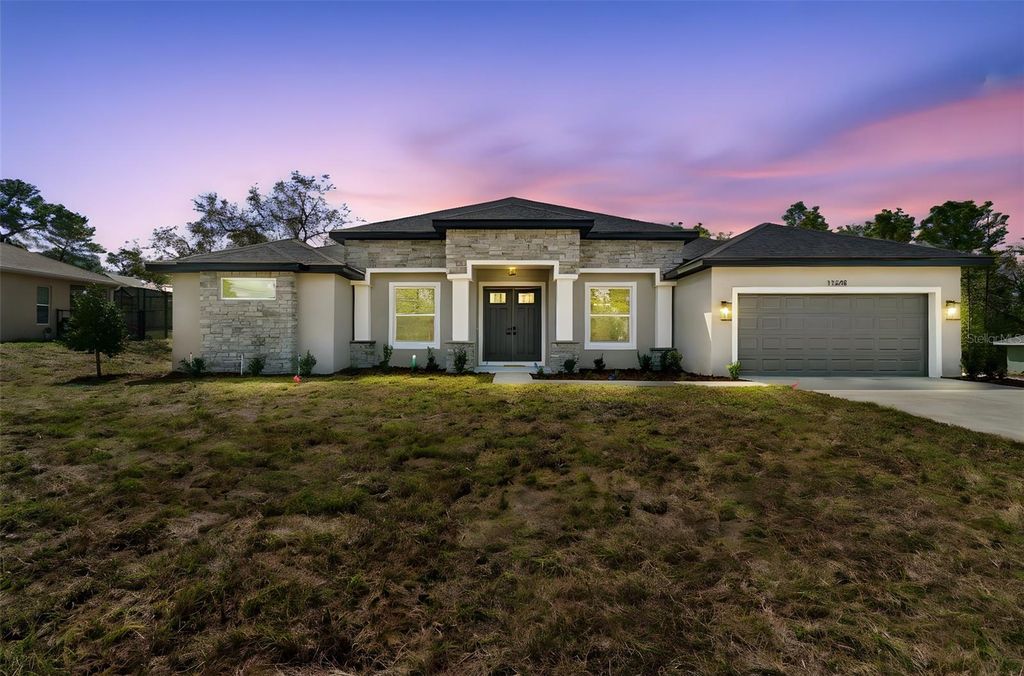 Photo of 11248 Flock Avenue, Weeki Wachee, FL 34613 (MLS # O6390777)