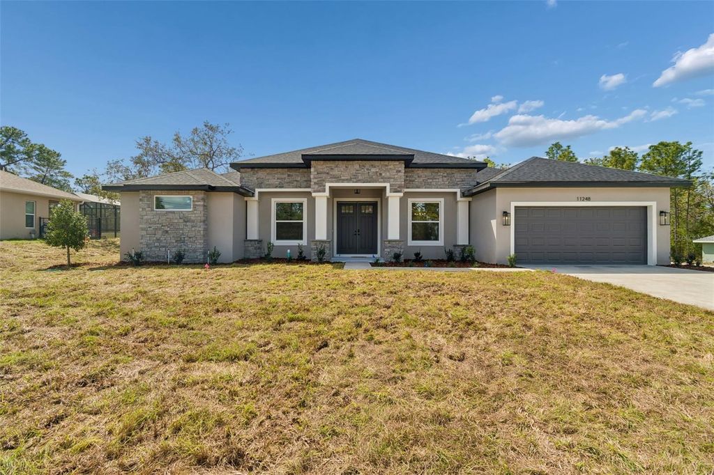 Photo of 11248 Flock Avenue, Weeki Wachee, FL 34613 (MLS # O6390777)