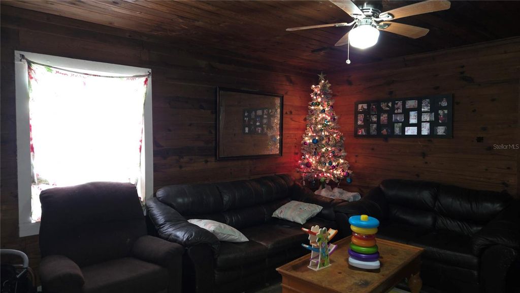 Photo of 883 NE Maple Lane, Lake City, FL 32055 (MLS # GC538428)