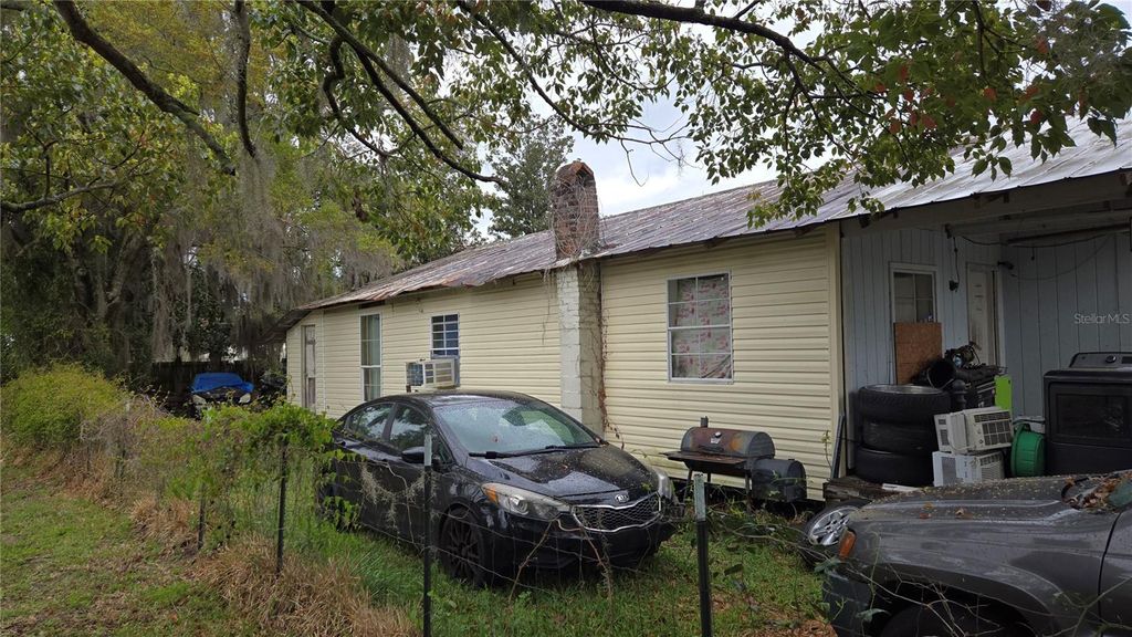 Photo of 883 NE Maple Lane, Lake City, FL 32055 (MLS # GC538428)