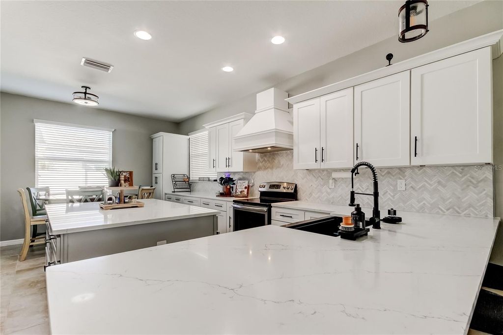 Photo of 5647 Fisher Glen Loop, Wesley Chapel, FL 33545 (MLS # TB8469741)