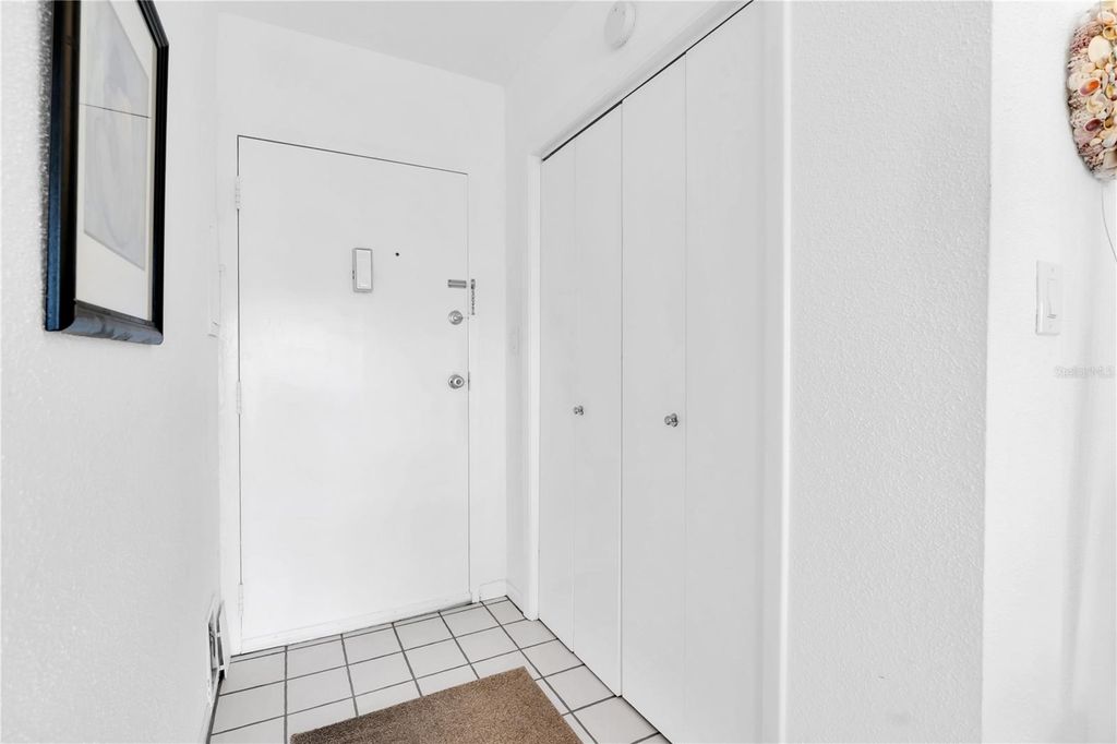 Photo of 10365 Paradise Boulevard #4, Treasure Island, FL 33706 (MLS # TB8504352)