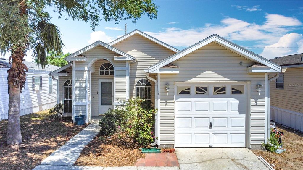 Photo of 50989 Highway 27 Dr #174, Davenport, FL 33897 (MLS # O6387837)