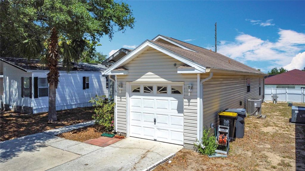 Photo of 50989 Highway 27 Dr #174, Davenport, FL 33897 (MLS # O6387837)