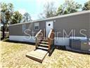 Photo of 5416 W Cougar Lane, Dunnellon, FL 34433 (MLS # OM726559)