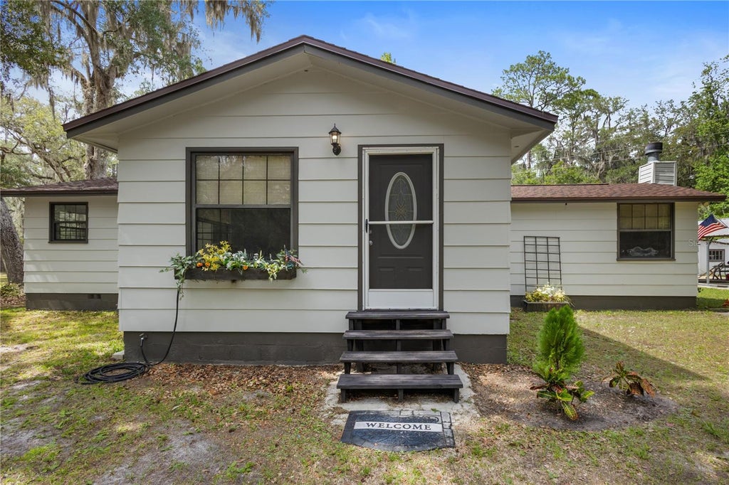 Photo of 11828 NE 7th Avenue, Gainesville, FL 32641 (MLS # GC540385)