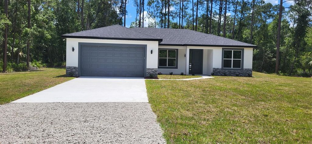 Photo of 1666 Berrybush Street, Bunnell, FL 32110 (MLS # O6369602)