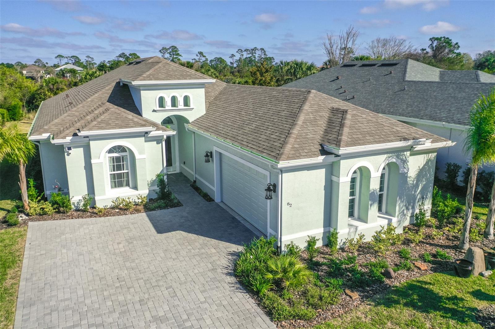 Owner will consider a 6-12 month lease or lease purchase/option. Stunning, newly built 3-bedroom, 3-bathroom home with an additional flex room that could be used as a home office, gym or music/hobby room is located in Palm Coast Plantation. Thoughtfully designed with high-end finishes, this home features soaring coffered ceilings, an open-concept layout, and abundant natural light. The heart of the home is the beautifully appointed kitchen, boasting sleek quartz countertops, a corner pantry, and an inviting island—ideal for both casual dining and entertaining. A dedicated office space ensures work-from-home convenience, while the split floor plan provides privacy for family and guests. The spacious owner’s suite is a true retreat, with serene backyard views, dual walk-in closets, and an elegant ensuite bath featuring tray ceilings, dual sinks, a walk-in shower, a garden tub, and a private water closet.The covered patio is perfect for outdoor dining and relaxation, with ample space to add a pool. Palm Coast Plantation offers an unparalleled lifestyle, combining natural beauty with top-tier amenities. Residents enjoy tennis and pickleball courts, a clubhouse, bocce, shuffleboard, a horseshoe pit, a playground, a fitness center, a game room, and a resort-style pool. Wildlife enthusiasts will appreciate the frequent sightings of deer, bald eagles, herons, osprey, and even otters. The community also provides convenient RV and boat storage, ensuring both security and accessibility. If you desire access to the ICW and ocean for your boat, slips are for sale nearby in a private marina. Located just minutes from Flagler Beach, you’ll have quick access to charming local dining and the beautiful Atlantic coastline. Experience the best of luxury living in Palm Coast Plantation—schedule your private showing today!