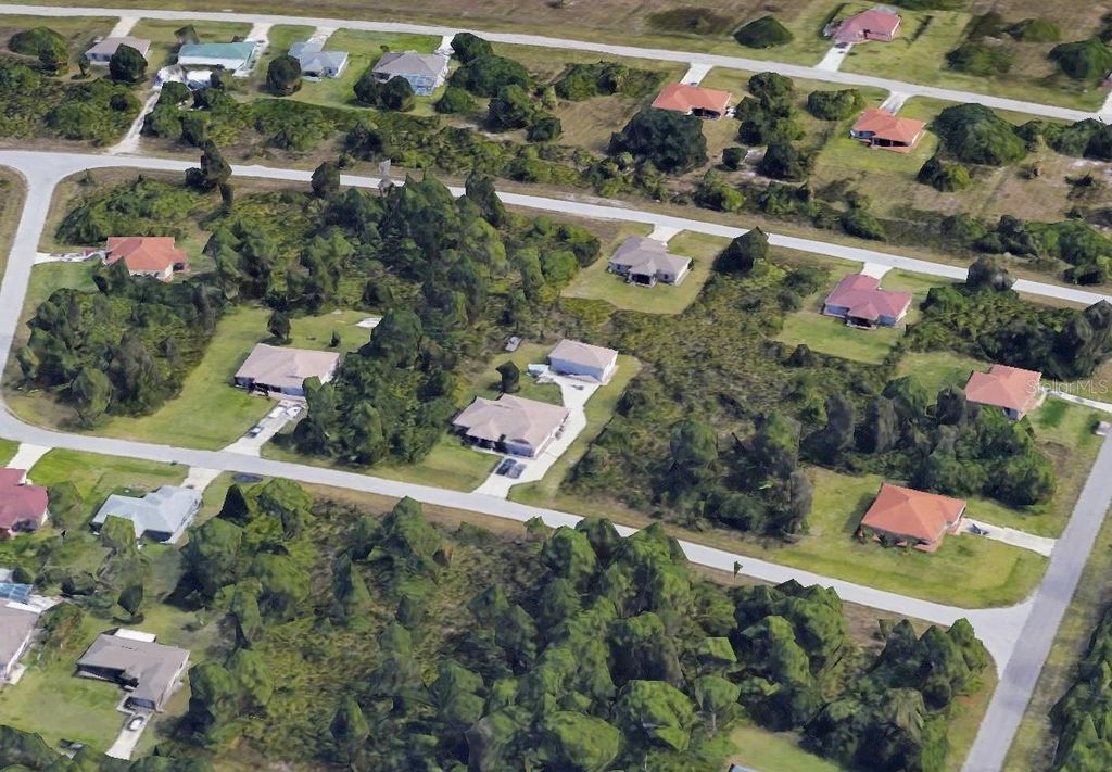 Photo of 416 Palmyra Avenue, Lehigh Acres, FL 33974 (MLS # TB8322467)