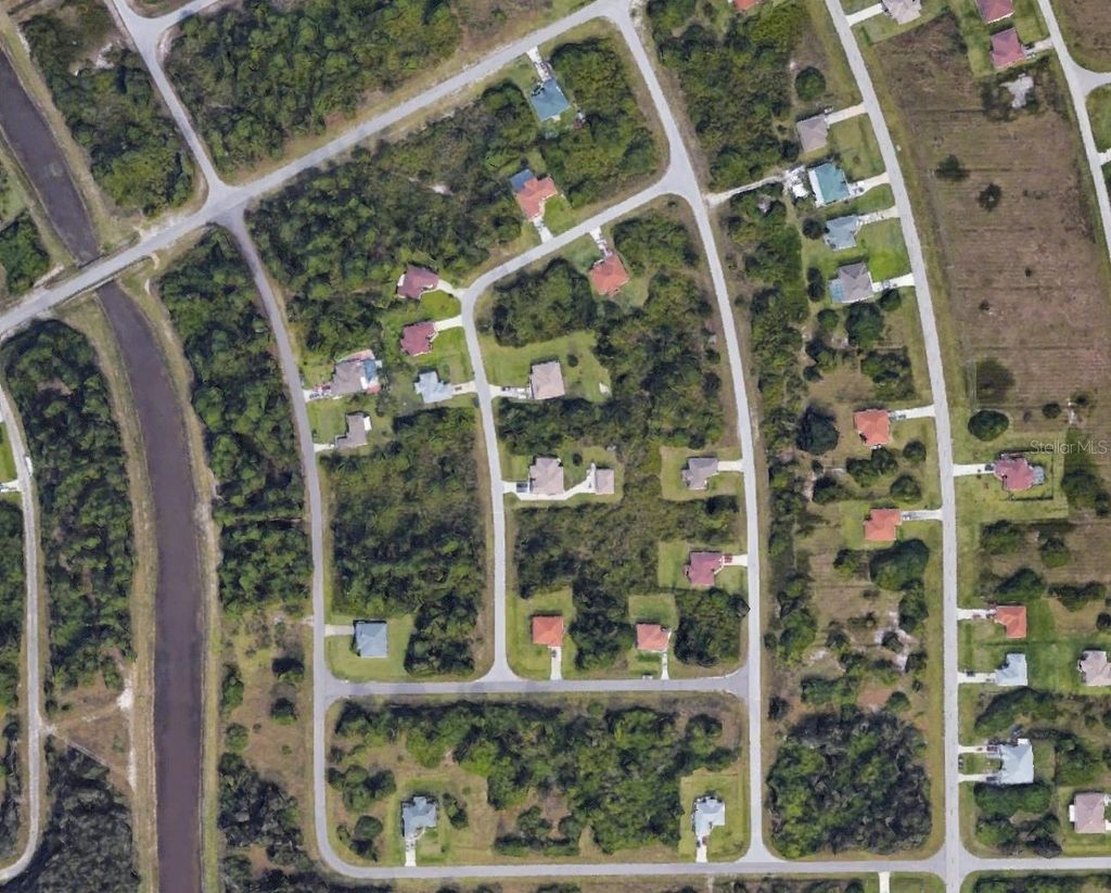 Photo of 416 Palmyra Avenue, Lehigh Acres, FL 33974 (MLS # TB8322467)