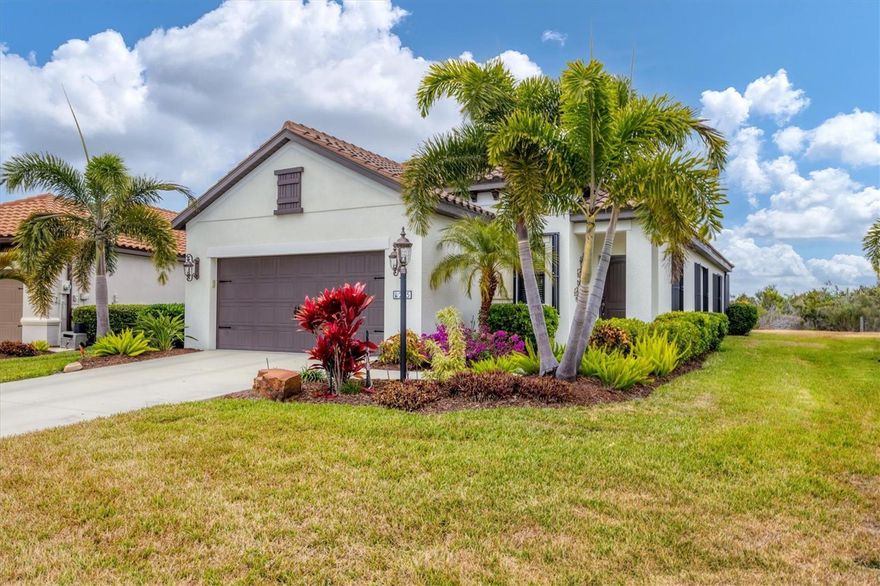 Welcome to easy Florida living in this inviting two-bedroom, two bath DETACHED home that is tucked inside an amenity rich, gated community in sunny Sarasota. This lightly lived-in residence features a bright, airy layout perfect for both everyday comfort and entertaining. The open kitchen is designed for both style and function, showcasing crisp white cabinetry, abundant counter space, and a seamless flow into the main living and dining areas. The spacious primary suite features ample closet space and a private bath with a large walk-in shower and doors built extra wide for easy access. The second generous bedroom is ideal for guests or a home office. Enjoy peaceful mornings and relaxed evenings on your very private, OVERSIZED lanai surrounded by lush landscaping. The resort-style amenities include a clubhouse, pool and spa, outdoor pavilion with fireplace, dog park, as well as pickleball and bocce courts. Milano is superbly located just minutes from pristine beaches, downtown Venice, dining, I-75 and the new Sarasota Memorial Hospital. Residents of the community benefit from an active lifestyle (with the amenities located just a short walk away), LOW HOA FEES and NO CDD FEES. Whether you are looking for a full-time residence or a seasonal retreat, this home checks all the boxes for relaxed coastal living.