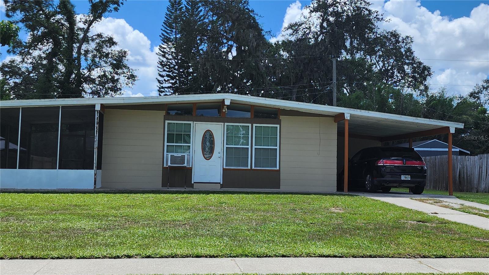 AFFORDABLE 3 BEDROOM 2 FULL BATH HOME IN NORTH TAMPA WITH NO HOA AND NO CDD FEES! SOLID CONCRETE BLOCK HOME WITH UPGRADED BATHS! FANTASTIC EASY CARE TERRAZO FLOORING THROUGHOUT THE HOME! MASTER BEDROOM HAS HUGE WALK-IN CLOSET & PRIVATE EN-SUITE BATHROOM WITH UPGRADED BEAUTIFUL SHOWER STALL! WINDOWS HAVE BEEN REPLACED & THE ELECTRICAL PANEL & OUTLETS & SWITCHES ALL UPDATED! NEWER HOT WATER HEATER! NICE STORAGE/LAUNDRY CLOSET UNDER 1 CAR CARPORT! SPACIOUS LIVING ROOM WITH ACCESS TO SIDE SCREENED PATIO! LARGE YARD WITH PARTIAL FENCING! COOL WINDOW UNITS THROUGHOUT HOME! HIGH AND DRY PROPERTY THAT HAS NO FLOOD INSURANCE REQUIREMENTS! EASY ACCESS TO INTERSTATE AND UNIVERSITY OF SOUTH FLORIDA! MOVE IN READY!