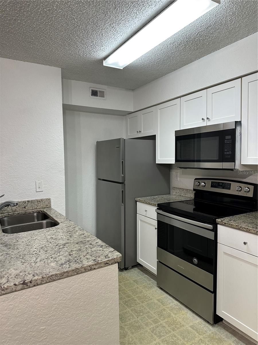 Photo of 2214 Metropolitan Way #1022, Orlando, FL 32839 (MLS # S5158826)