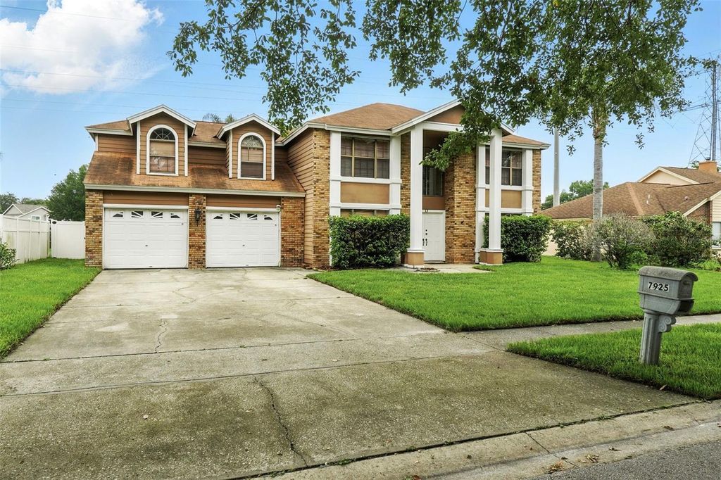 Photo of 7925 Tumblestone Drive, Orlando, FL 32819 (MLS # O6419619)