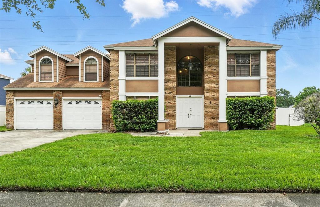 Photo of 7925 Tumblestone Drive, Orlando, FL 32819 (MLS # O6419619)