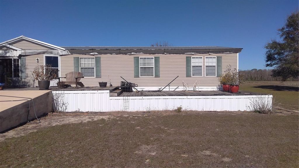 Photo of 12051 Avon Park Cut Off Road, Fort Meade, FL 33841 (MLS # C7520534)