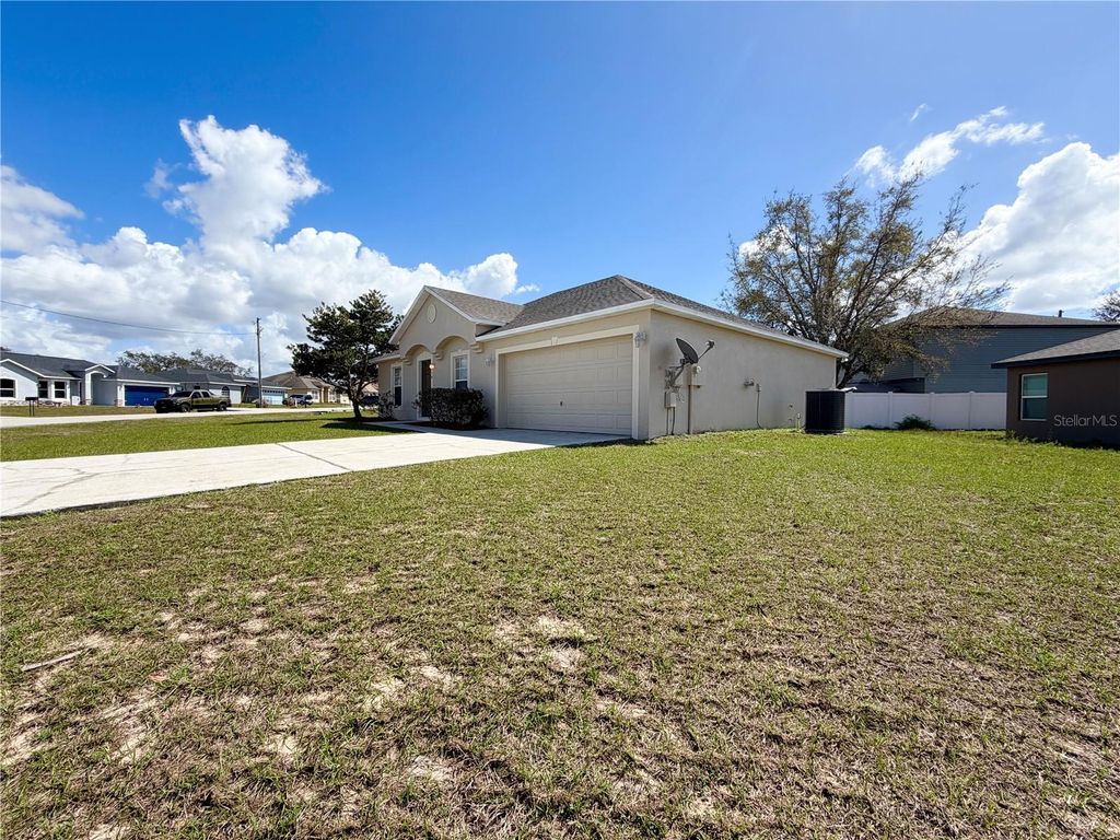 Photo of 1914 Manatee Court, Kissimmee, FL 34759 (MLS # O6388972)