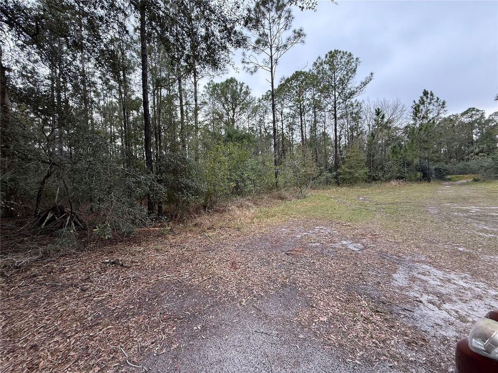 Photo of 1012 Indian Lake Drive #7, Indian Lake Estates, FL 33855 (MLS # O6241846)