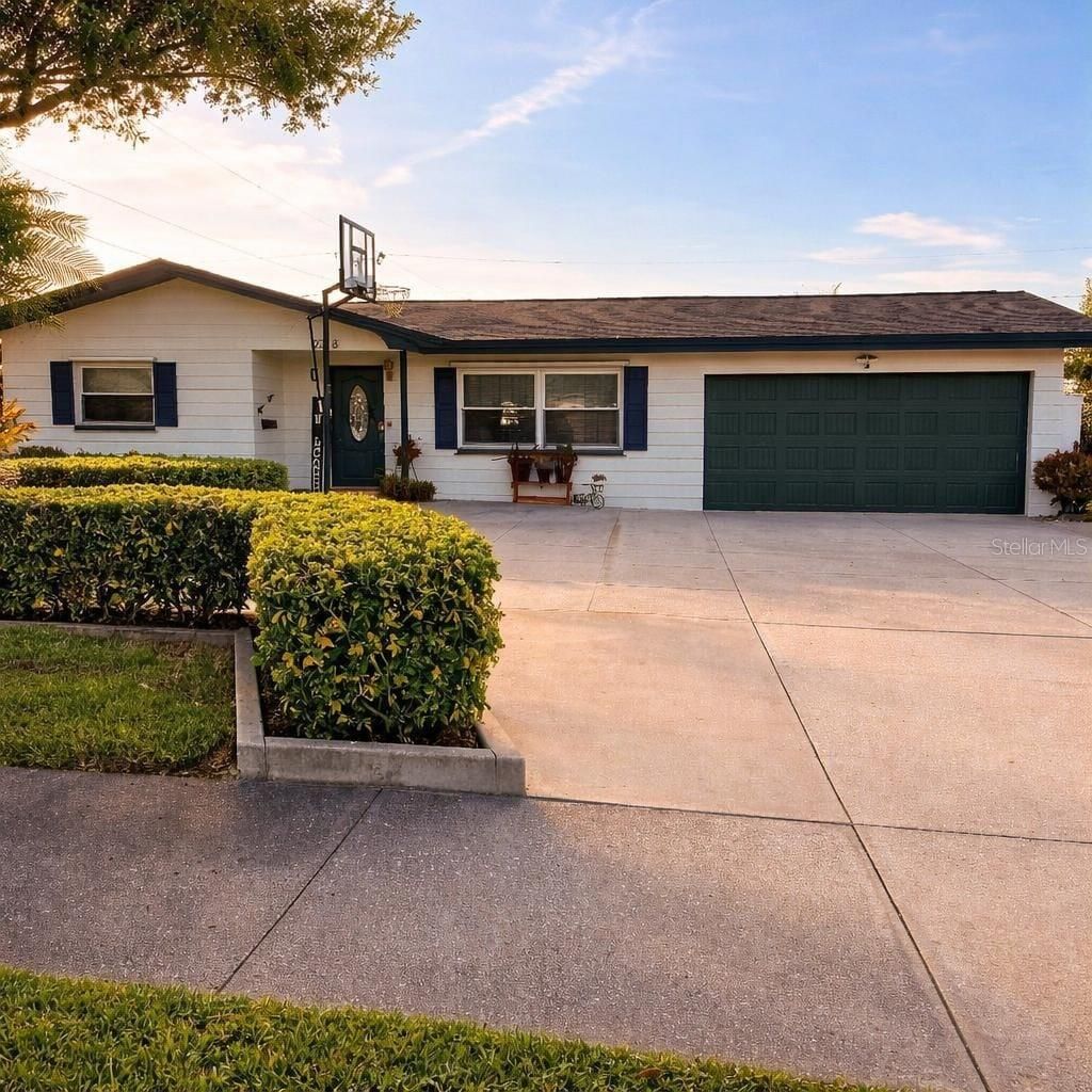 Photo of 2218 8th Avenue SW, Largo, FL 33770 (MLS # O6381588)