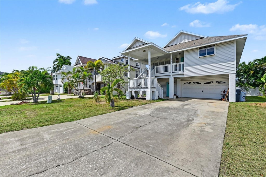 Photo of 230 125th Avenue, Treasure Island, FL 33706 (MLS # TB8552301)