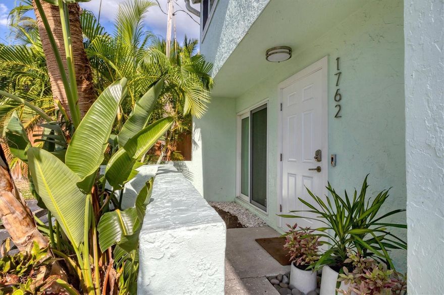 Located just steps from the bridge to the world-famous Siesta Key Beach, this beautifully updated two-story end-unit townhouse offers 2 bedrooms, 1.5 bathrooms, and approximately 1,042 square feet of comfortable living space. The first floor features an open layout with a bright living room, dining area, and a modern kitchen equipped with stainless steel appliances and quartz countertops. A private screened patio overlooks a peaceful courtyard and provides easy access to the community’s heated pool—perfect for relaxing or entertaining.
Upstairs, the spacious primary bedroom offers generous closet space and shares a full bathroom with the guest bedroom. Additional conveniences include in-unit laundry hookups and two assigned parking spaces. Originally built in 1980, the home has been fully renovated with updated wiring, plumbing, porcelain tile flooring, and stylish modern fixtures.
With only 15 units in the complex and a prime Sarasota location close to shopping, dining, and beautiful Siesta Key, this property is ideal as a full-time residence, vacation getaway, or investment opportunity. Don’t miss your chance to own a move-in-ready home in one of Sarasota’s most desirable areas.
