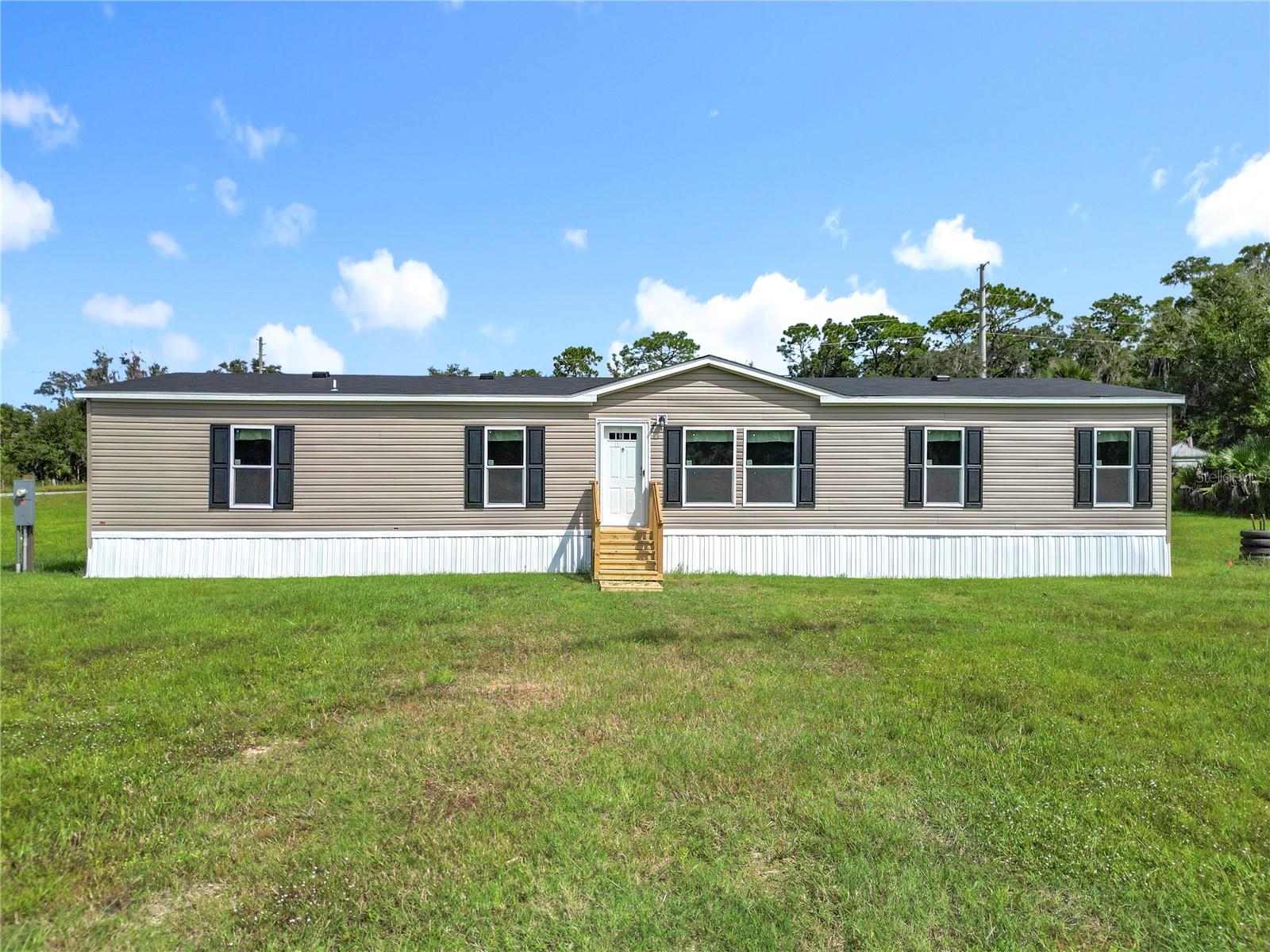 Excellent opportunity to own a BRAND NEW 2025 Manufactured Home in Crystal River! This spacious 4 bedroom, 2 bath home sits on over 1.3 acres, offering room to spread out and endless possibilities for outdoor living. Location is everything — just minutes from the river, local marinas, and the famous Rainbow Springs. There’s even a nearby RV resort for weekend getaways or guests. Enjoy the best of both worlds: close to nature and recreation, yet with easy access to shops, dining, and everyday conveniences. No HOA means no extra fees or restrictive rules. Everything is NEW — roof, HVAC, well, septic, and appliances. Modern open floor plan with a large kitchen, pantry, dining and living areas filled with natural light. Generous bedrooms all feature walk-in closets, and the master suite offers a garden tub and separate shower. Energy-efficient windows and contemporary finishes make this home both stylish and practical. Move-in ready, financeable, and insurable. Don’t miss this chance to enjoy Florida living at its best!. ***Be sure to check out the Virtual Tour for a full walkthrough of this beautiful new home***