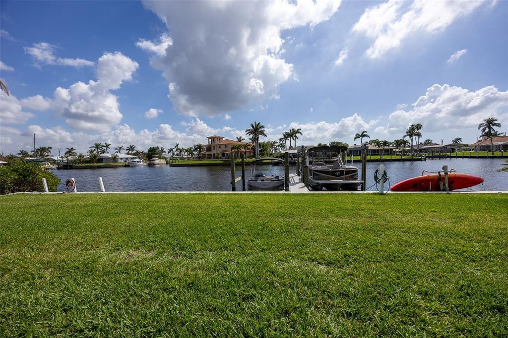 Photo of 316 Tudor Drive #1-2, Cape Coral, FL 33904 (MLS # C7513475)