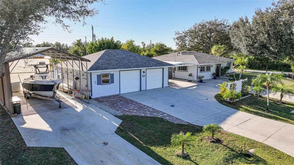 Photo of 4639 Kempson Lane, Port Charlotte, FL 33981 (MLS # O6419567)