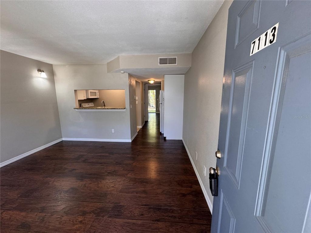 Photo of 7113 E Bank Drive #103, Tampa, FL 33617 (MLS # O6349645)