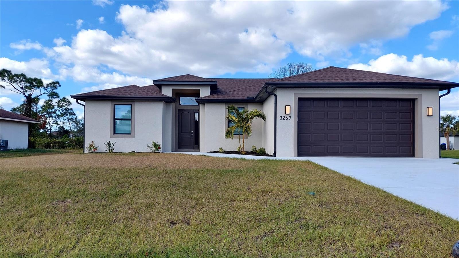 MOVE IN READY BRAND NEW HOME just completed. There are many convenient upgrades in this home which add to the enjoyable living space. The den can be utilized as a 4th bedroom, a home office, TV room etc. The spacious 2 car garage has a finished floor, upgraded lighting fixtures and the long driveway can accommodate numerous vehicles.
This open floor plan has high ceilings, french doors opening to the spacious 19' x 11' covered lanai, quartz countertops in kitchen and both baths, stainless steel kitchen appliances, LVT flooring throughout (no carpet) and window treatments on all windows. The master suite has a large walk-in closet, dual vanity sinks and walk-in full tiled shower. The guest bath has a full tiled shower/tub combination. The wood kitchen cabinets, gigantic island and large pantry provide abundant storage space. Next to the kitchen is the laundry room which has washer and dryer hookups with storage cabinets. Upscale remote-control fans and LED lighting are provided in all living spaces. This home also has public city water thus there is no need for a water well.
This home is centrally located near schools, churches, shopping, highways, parks and many outdoor activities.