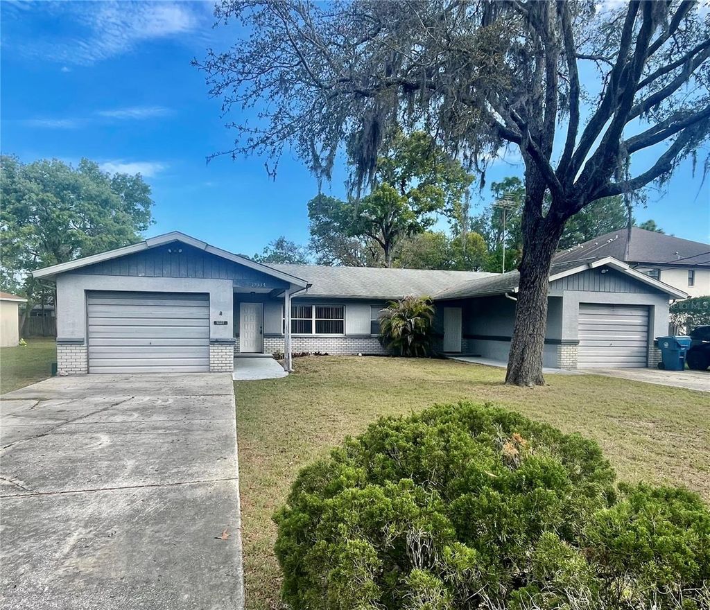 Photo of 10337 Usher Street, Spring Hill, FL 34608 (MLS # TB8501197)