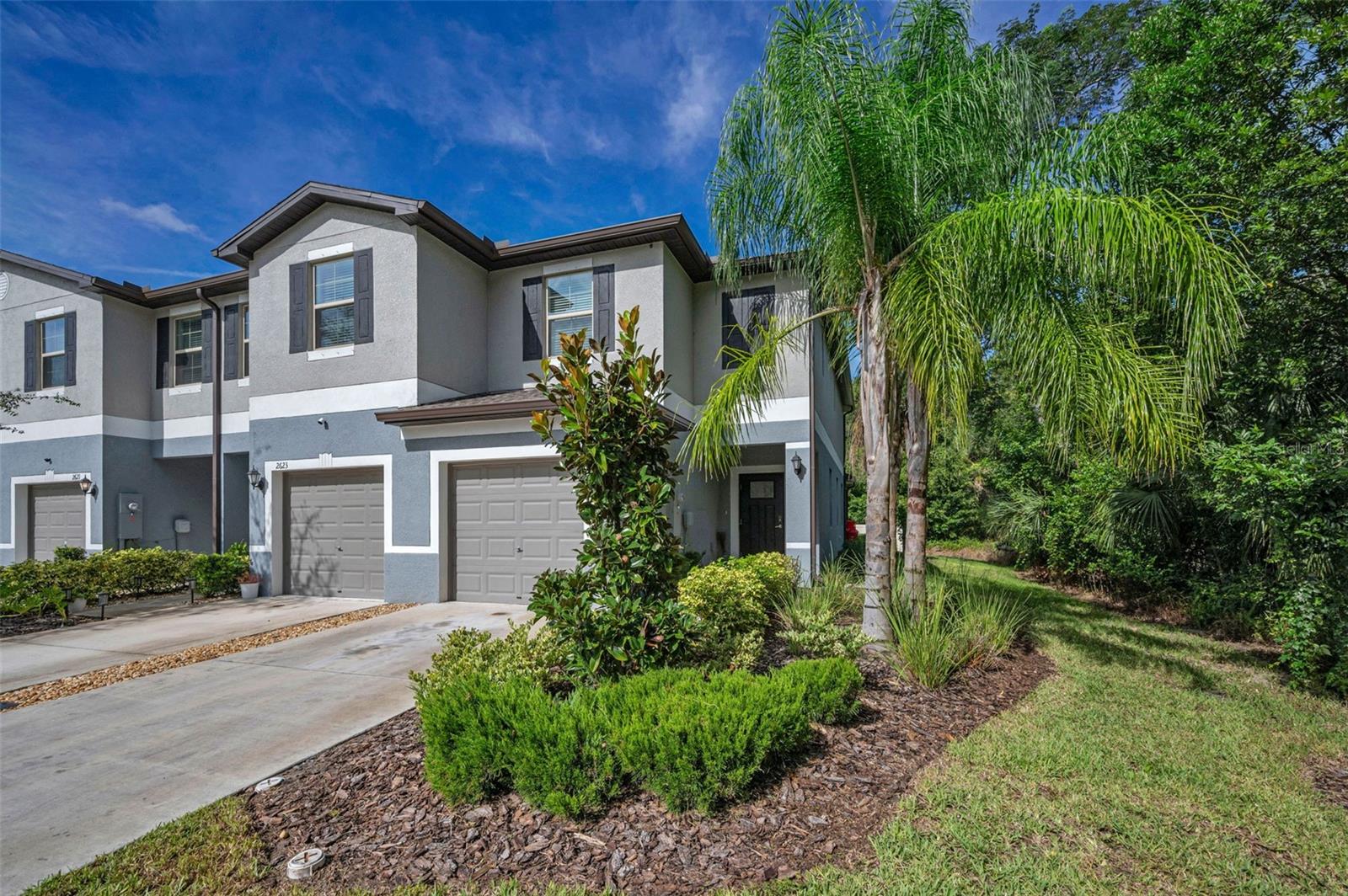 Welcome to effortless living in Holiday—perfectly positioned between the historic charm of Tarpon Springs and the natural wonders of Weeki Wachee. This beautifully maintained newer 2-bedroom, 2.5-bath end-unit townhome offers privacy, space, and modern comfort in one of Florida’s most underrated coastal communities.
Step into a bright, open-concept layout featuring high ceilings and abundant natural light. The kitchen is thoughtfully designed with solid surface, stainless steel appliances, and generous cabinetry—ideal for everyday cooking and casual entertaining.
Upstairs, the spacious primary suite includes a walk-in closet and a private ensuite bath. Two additional bedrooms provide flexibility for guests, remote work, or creative pursuits. The washer and dryer are conveniently located upstairs, making laundry day a breeze.
This end unit offers enhanced privacy, extra windows, and a quieter living experience. The private patio is perfect for morning coffee or winding down after a beach day.
A spacious one-car garage with extra storage adds convenience, while smart home upgrades and energy-efficient systems provide modern comfort. Located in a pet-friendly community with low HOA fees, this townhome also offers quick access to US-19, shopping, dining, and some of Florida’s most beautiful Gulf Coast beaches. Whether you're a first-time buyer, seasonal resident, or investor, this property delivers style, value, and location-all wrapped in a quiet coastal setting.