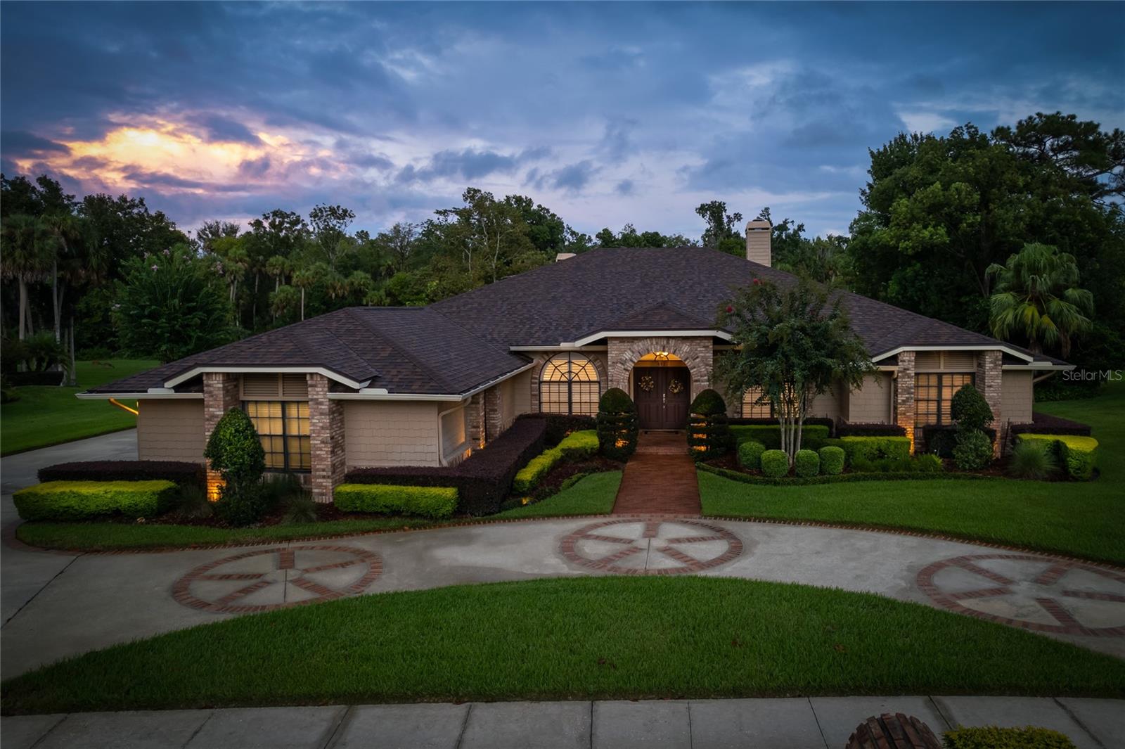 Welcome to this stunning pool home in the highly sought-after community of Sabal Point. Offering 4 bedrooms and 3.5 baths, the home begins with spacious formal living and dining rooms accented by plantation shutters. The oversized family room features vaulted ceilings, a brick wood-burning fireplace, and a built-in bar, while flowing seamlessly into the kitchen and breakfast nook. From here, you’ll enjoy views of the screened pool and pond, creating the perfect setting for entertaining. The kitchen provides abundant counter space with durable solid-surface countertops, dual ovens, a glass cooktop, and a stainless-steel refrigerator. The master retreat is generously sized and includes tray ceilings, a private wood-burning fireplace, his-and-hers walk-in closets, deck access, and a spa-like bath with dual vanities, a garden tub, and a walk-in shower. Secondary bedrooms are equally spacious, and fresh interior paint adds to the move-in-ready feel. Set on a half-acre lot, the property backs to a tranquil pond stocked with bass and frequented by deer, delivering a private and serene oasis. Families will also appreciate the home’s location within the highly regarded Seminole County School District, with Sabal Point Elementary—an “A”-rated school—just minutes away by car or bike. Beyond the home itself, Sabal Point offers tree-lined streets, walking trails, playgrounds, and community parks, creating a true lifestyle neighborhood. Among the many beautiful homes in Sabal Point, this one stands out as one of the community’s best lots thanks to its size, setting, and unmatched location.